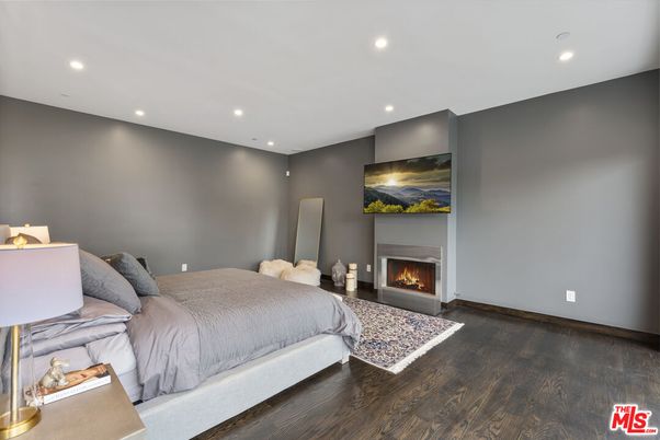 Bedroom, Fireplace, Interior, Recessed Lighting, Wood Texture Flooring