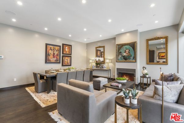Dining room, Fireplace, Interior, Living room, Recessed Lighting, Wood Texture Flooring