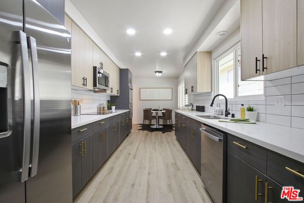 Dining room, Interior, Kitchen, Recessed Lighting, Stainless Steel Appliances, Wood Texture Flooring