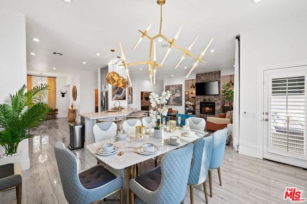 Dining room, Fireplace, Interior, Living room, Pendant Lights, Recessed Lighting, Wood Texture Flooring