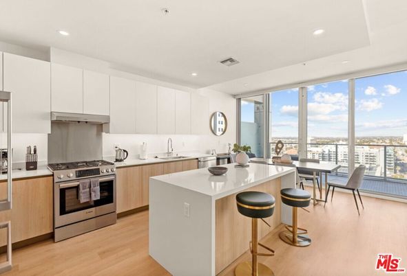 Dining room, Interior, Kitchen, Recessed Lighting, Stainless Steel Appliances, Wood Texture Flooring