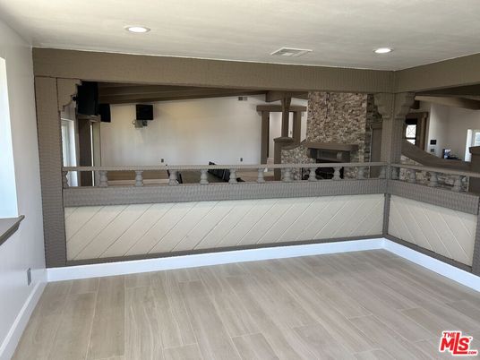 Fireplace, Interior, Recessed Lighting, Stone Walls, Wood Texture Flooring