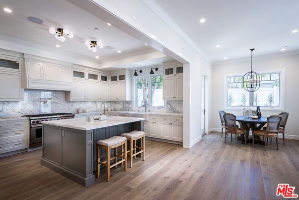 Dining room, Interior, Kitchen, Marble Walls, Pendant Lights, Recessed Lighting, Stainless Steel Appliances, Wood Texture Flooring
