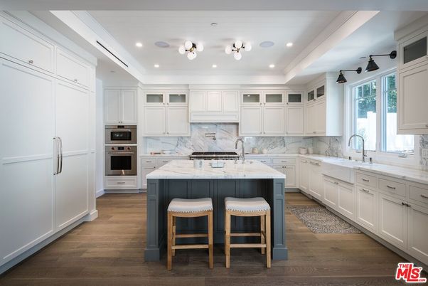 Interior, Kitchen, Marble Walls, Recessed Lighting, Stainless Steel Appliances, Wood Texture Flooring