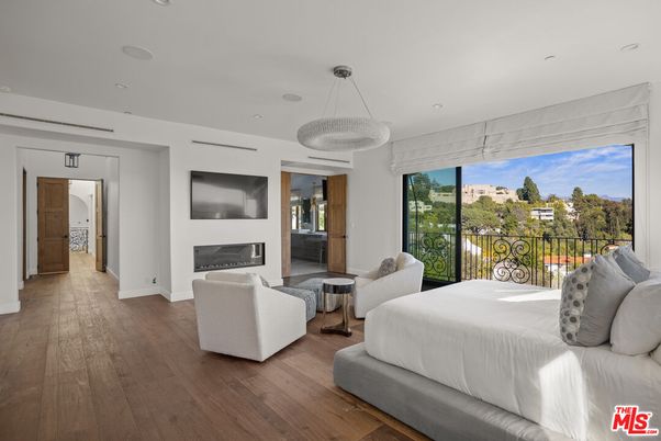 Bedroom, Fireplace, Interior, Pendant Lights, Recessed Lighting, Wood Texture Flooring