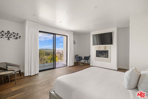 Bedroom, Fireplace, Interior, Recessed Lighting, Wood Texture Flooring