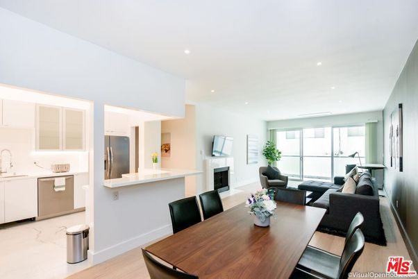 Dining room, Fireplace, Interior, Kitchen, Living room, Recessed Lighting, Stainless Steel Appliances, Wood Texture Flooring