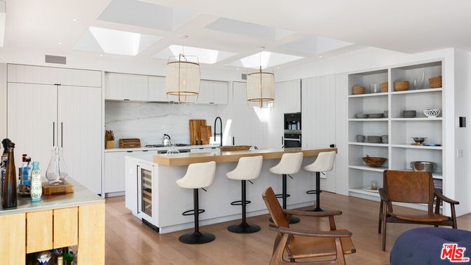 Interior, Kitchen, Marble Walls, Pendant Lights, Recessed Lighting, Stainless Steel Appliances, Wood Texture Flooring