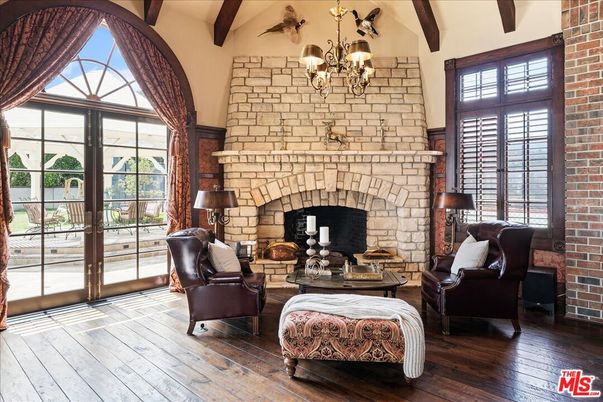 Chandelier, Fireplace, Interior, Living room, Stone Walls, Wooden Beams, Wood Texture Flooring