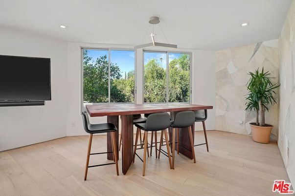 Dining room, Interior, Marble Walls, Pendant Lights, Recessed Lighting, Wood Texture Flooring