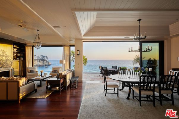 Dining room, Fireplace, Interior, Living room, Pendant Lights, Water, Wood Texture Flooring
