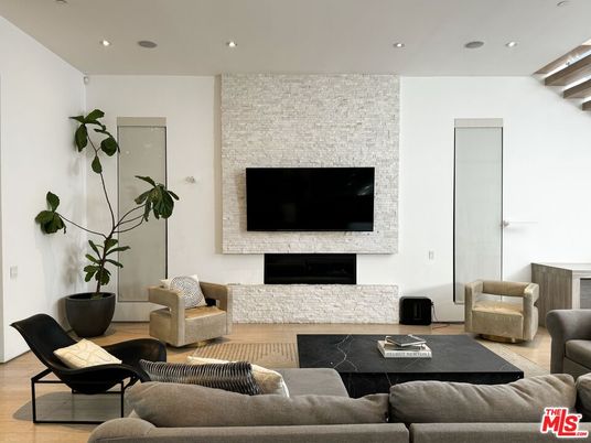 Fireplace, Interior, Living room, Recessed Lighting, Wood Texture Flooring