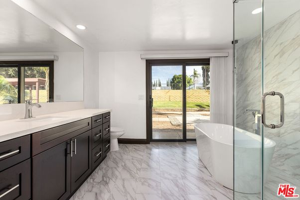 Bathroom, Dual Sink Vanities, Free Standing Baths, Glass Shower, Interior, Marble, Marble Walls, Recessed Lighting