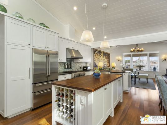 Chandelier, Dining room, Interior, Kitchen, Pendant Lights, Recessed Lighting, Stainless Steel Appliances, Wood Texture Flooring