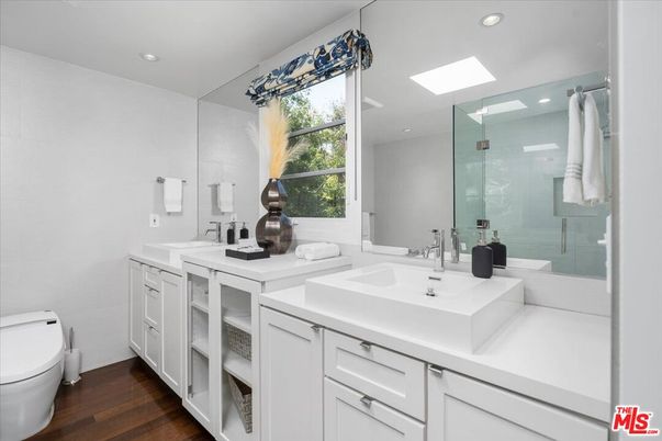 Bathroom, Dual Sink Vanities, Glass Shower, Interior, Recessed Lighting, Wood Texture Flooring