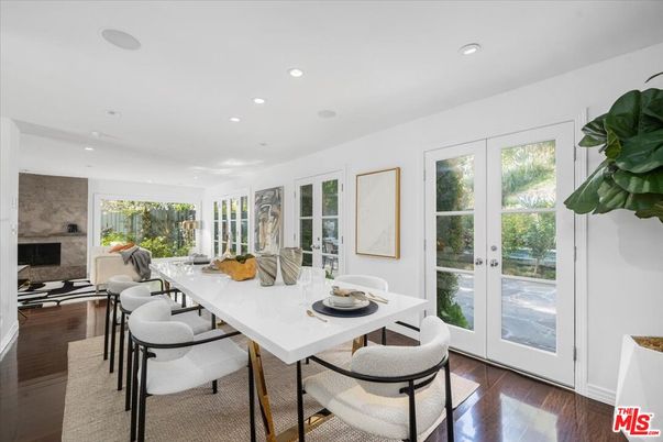 Dining room, Fireplace, Interior, Living room, Recessed Lighting, Wood Texture Flooring