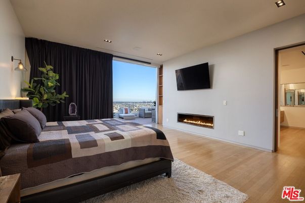 Bedroom, Fireplace, Interior, Recessed Lighting, Wood Texture Flooring