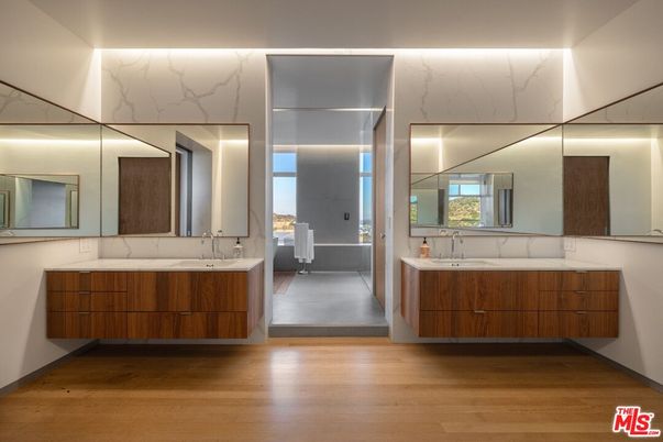 Bathroom, Dual Sink Vanities, Interior, Marble Walls, Wood Texture Flooring