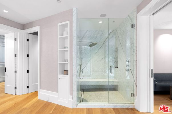 Bathroom, Glass Shower, Interior, Marble Walls, Recessed Lighting, Wood Texture Flooring