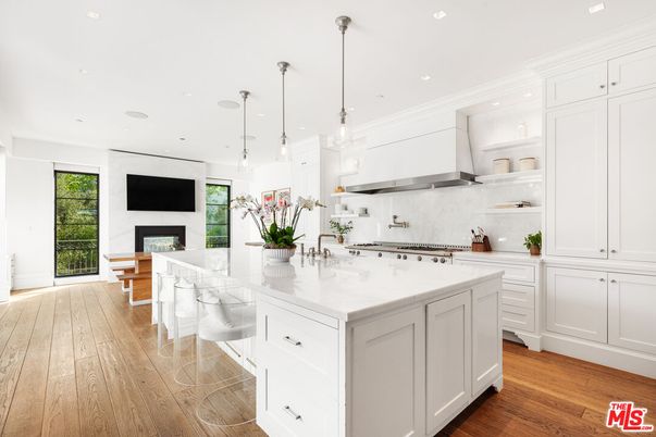 Dining room, Fireplace, Interior, Kitchen, Pendant Lights, Recessed Lighting, Stainless Steel Appliances, Wood Texture Flooring
