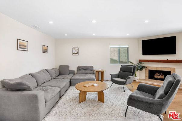 Fireplace, Interior, Living room, Recessed Lighting, Wood Texture Flooring