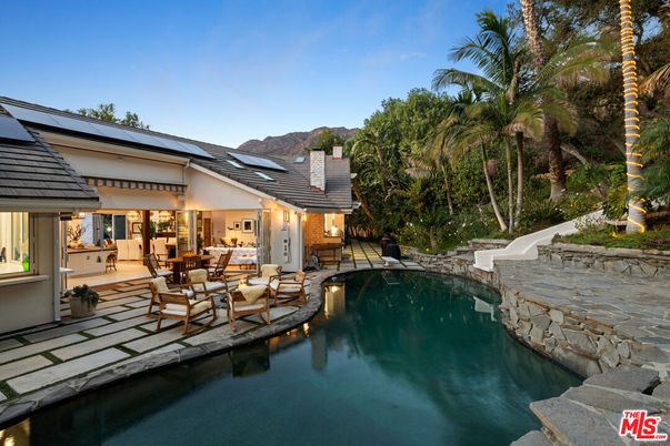 Exterior, Pool, Solar Panels