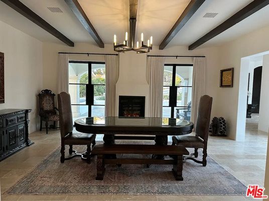 Chandelier, Dining room, Fireplace, Interior, Wooden Beams