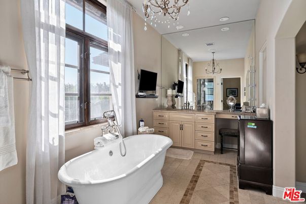 Bathroom, Chandelier, Dual Sink Vanities, Free Standing Baths, Interior, Recessed Lighting