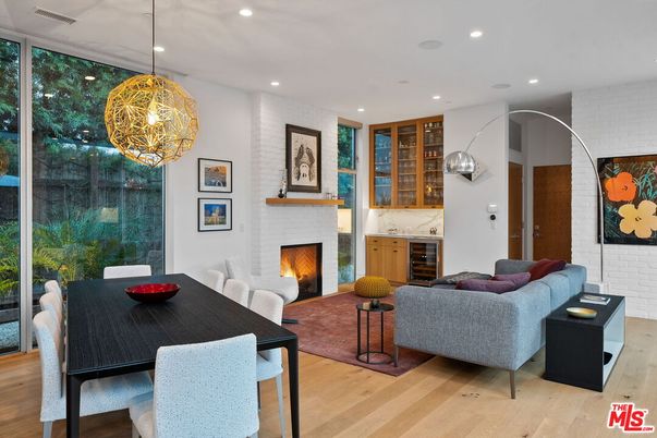 Dining room, Fireplace, Interior, Living room, Pendant Lights, Recessed Lighting, Wood Texture Flooring
