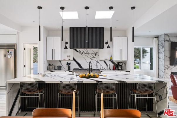 Interior, Kitchen, Marble Walls, Pendant Lights, Recessed Lighting, Stainless Steel Appliances