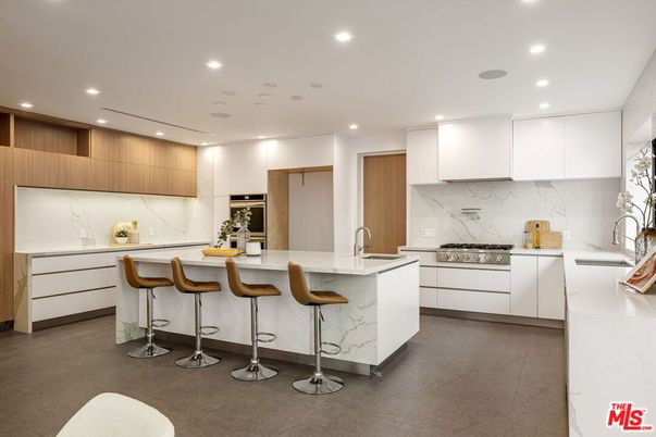 Interior, Kitchen, Marble Walls, Recessed Lighting, Stainless Steel Appliances