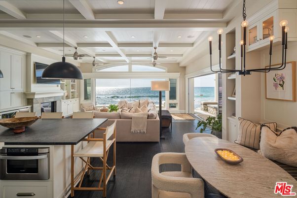 Dining room, Fireplace, Interior, Kitchen, Living room, Pendant Lights, Recessed Lighting, Water, Wood Texture Flooring