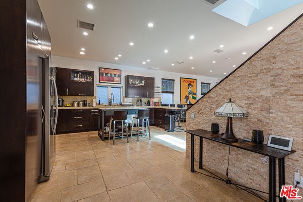Interior, Kitchen, Recessed Lighting, Stainless Steel Appliances, Stone Walls