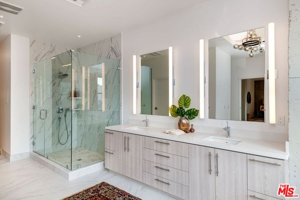 Bathroom, Dual Sink Vanities, Glass Shower, Interior, Marble, Marble Walls, Recessed Lighting