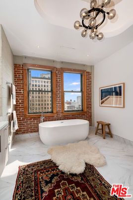Bathroom, Free Standing Baths, Interior, Marble, Pendant Lights, Recessed Lighting, Stone Walls