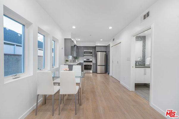 Dining room, Interior, Kitchen, Recessed Lighting, Stainless Steel Appliances, Wood Texture Flooring