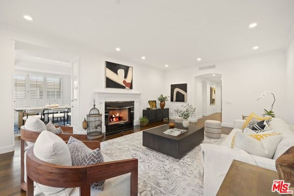 Dining room, Fireplace, Interior, Living room, Recessed Lighting, Wood Texture Flooring