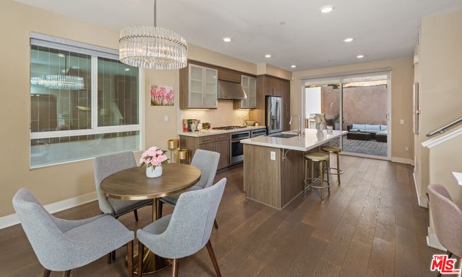 Chandelier, Dining room, Interior, Kitchen, Recessed Lighting, Stainless Steel Appliances, Wood Texture Flooring