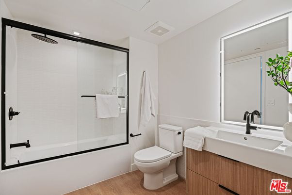 Bathroom, Glass Shower, Interior, Recessed Lighting, Wood Texture Flooring