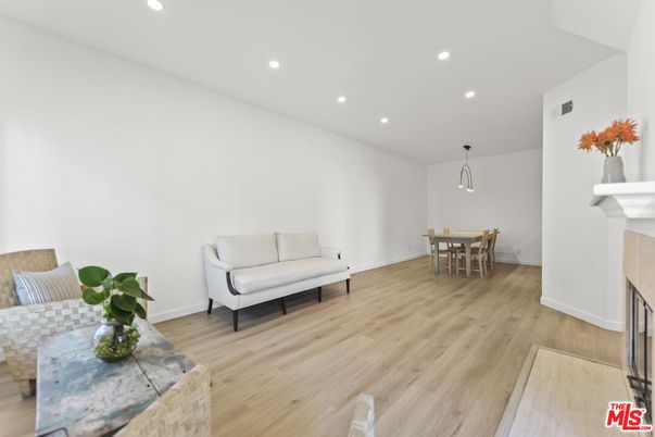 Dining room, Fireplace, Interior, Pendant Lights, Recessed Lighting, Wood Texture Flooring