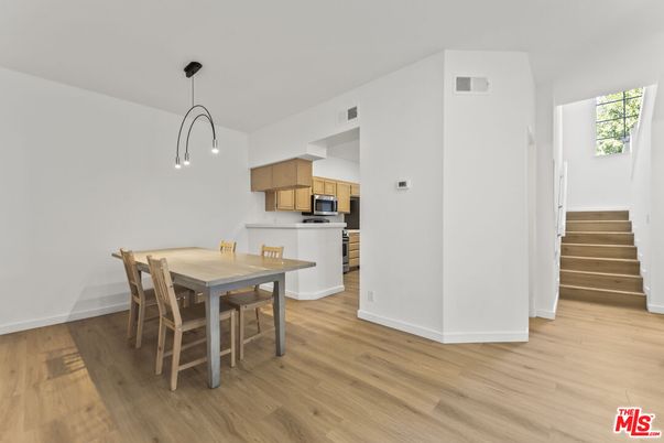 Dining room, Interior, Kitchen, Pendant Lights, Stainless Steel Appliances, Wood Texture Flooring