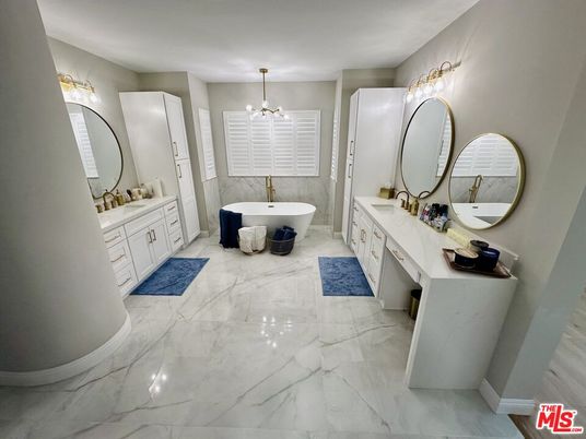 Bathroom, Chandelier, Dual Sink Vanities, Free Standing Baths, Interior, Marble, Pendant Lights
