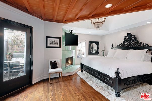 Bedroom, Chandelier, Fireplace, Interior, Recessed Lighting, Wooden Beams, Wooden Ceilings, Wood Texture Flooring