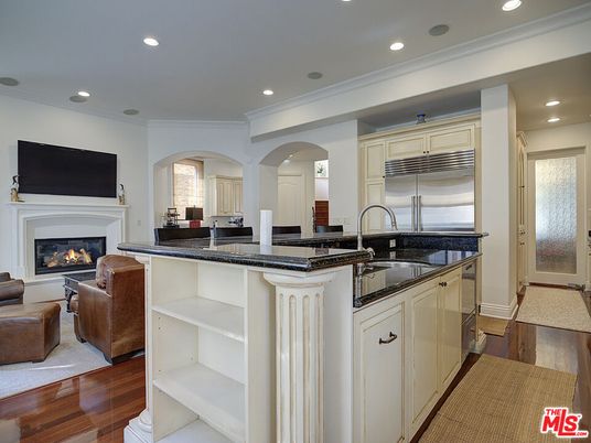 Fireplace, Interior, Kitchen, Living room, Recessed Lighting, Stainless Steel Appliances, Wood Texture Flooring