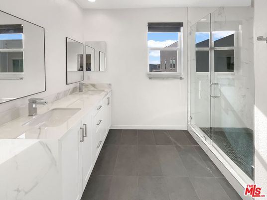 Bathroom, Dual Sink Vanities, Glass Shower, Interior, Marble Walls, Recessed Lighting