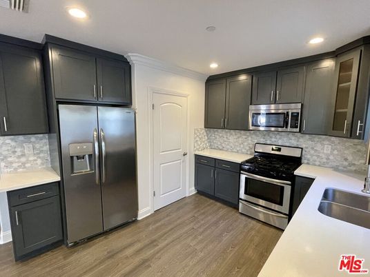 Interior, Kitchen, Recessed Lighting, Stainless Steel Appliances, Wood Texture Flooring