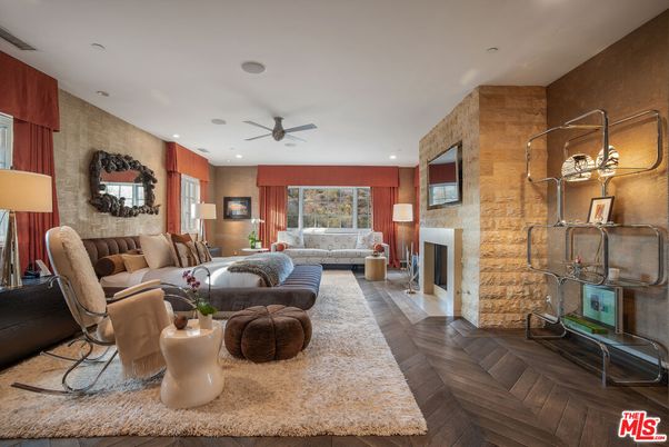 Fireplace, Interior, Living room, Recessed Lighting, Stone Walls, Wood Texture Flooring