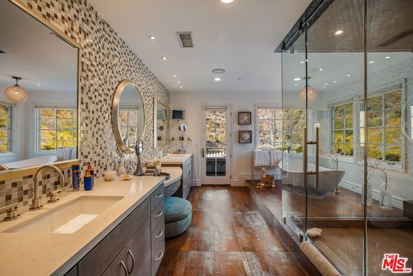 Bathroom, Dual Sink Vanities, Free Standing Baths, Interior, Pendant Lights, Recessed Lighting, Wood Texture Flooring