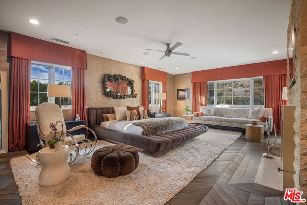 Bedroom, Fireplace, Interior, Living room, Recessed Lighting, Stone Walls, Wood Texture Flooring