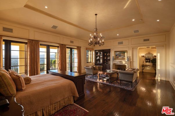 Bedroom, Chandelier, Fireplace, Interior, Living room, Recessed Lighting, Water, Wood Texture Flooring